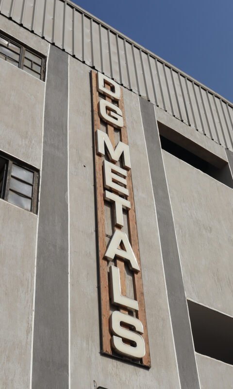 DG Metals mounted on warehouse wall