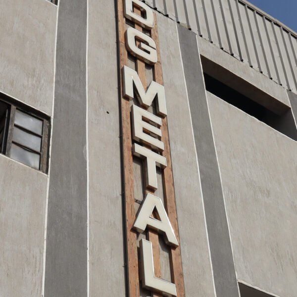 DG Metals mounted on warehouse wall
