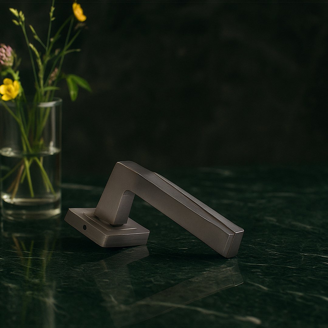 KEPA-501 Silver front view KEPA 501 silver door handle placed on a green marble surface