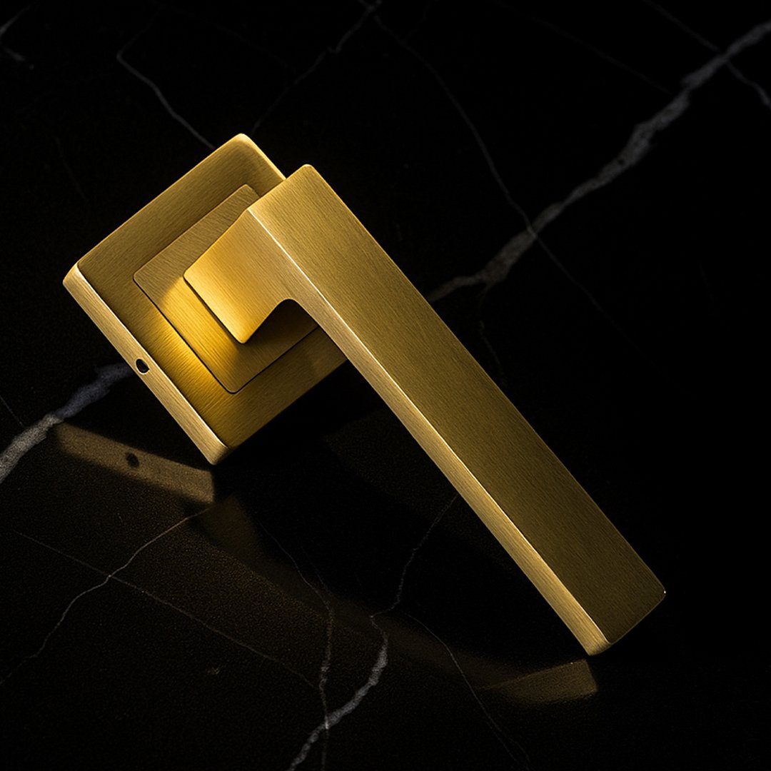 KEPA-505 KEPA 505 gold door handle placed on a black marble surface