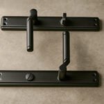 SQIEK 551 Black backplate Bathroom Handle set place on a marble surface