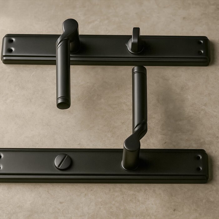 SQIEK 551 Black backplate Bathroom Handle set place on a marble surface